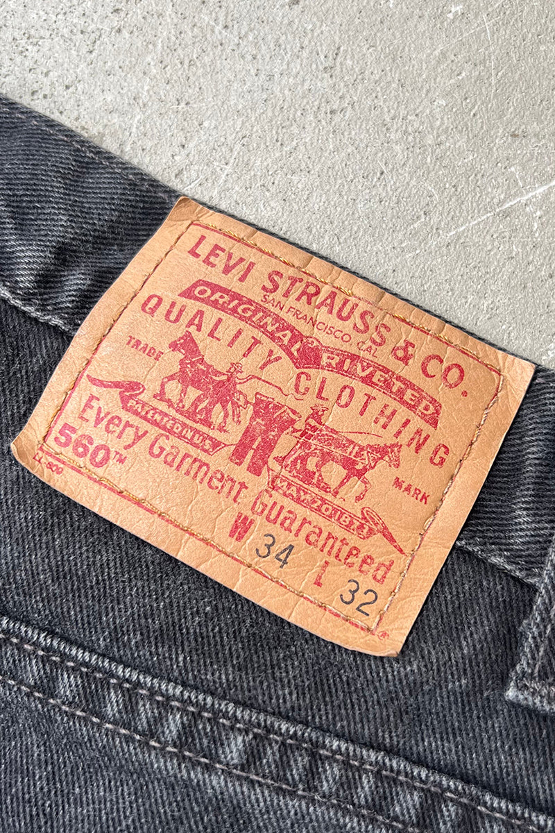 MADE IN USA 90'S 560 DENIM PANTS / SULFUR BLACK [SIZE: 34 USED]