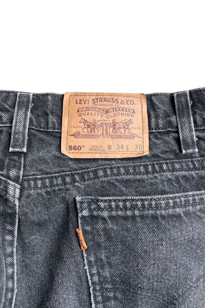 MADE IN USA 94'S ORANGE TAB 560 DENIM PANTS SULFUR BLACK / BLACK [SIZE: 34 USED]