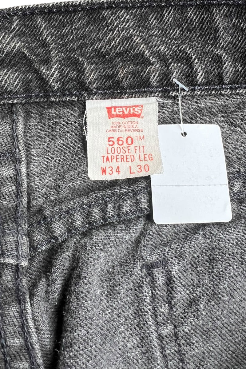 MADE IN USA 94'S ORANGE TAB 560 DENIM PANTS SULFUR BLACK / BLACK [SIZE: 34 USED]