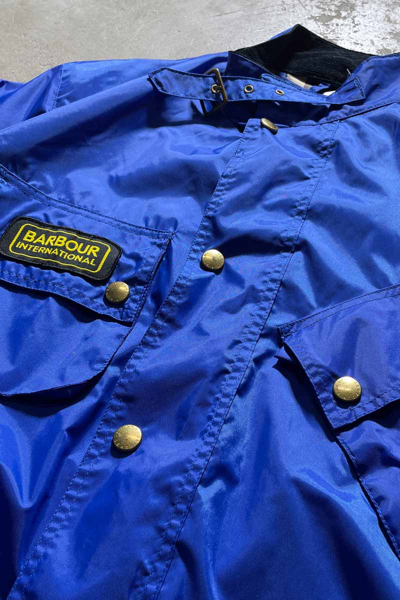INTERNATIONAL ZIP UP NYLOIN JACKET W/BELT / BLUE [SIZE: M USED]