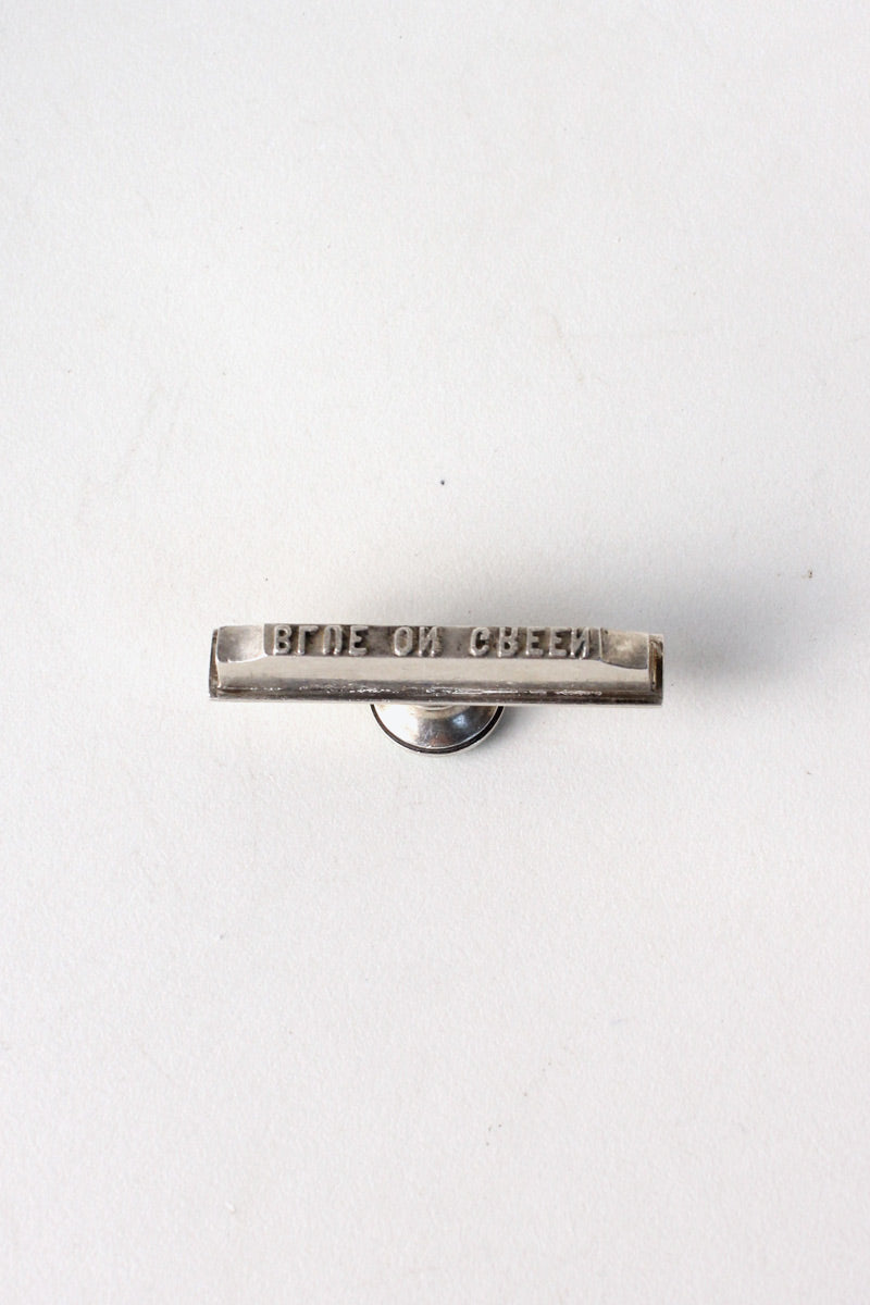 SILVER "BLUE ON GREEN" STAMP [SIZE: ONE SIZE USED]